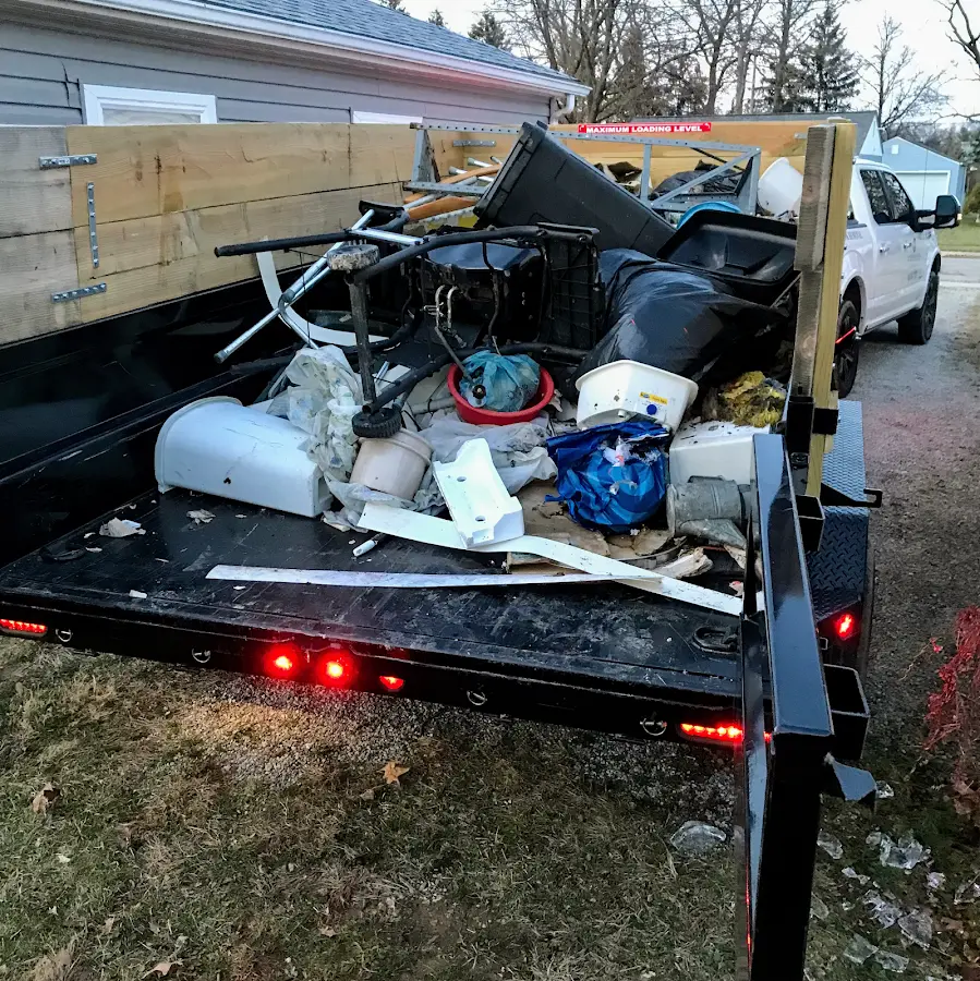 Roll-off dumpster delivered to a residential driveway in Seneca Falls