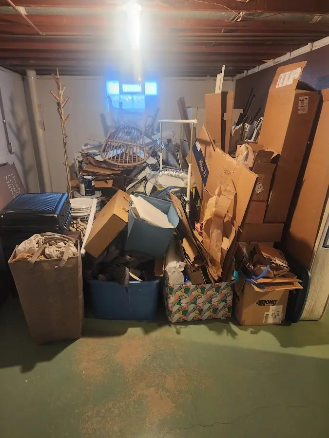 Roll-off dumpster container at job site for 2 Yard Dumpster Rental in Seneca Falls